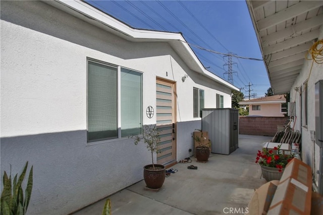 view of home's exterior featuring a patio