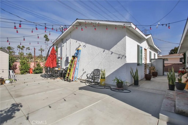 view of home's exterior with a patio area