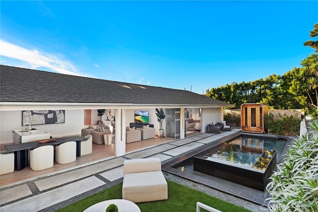 view of swimming pool with a patio