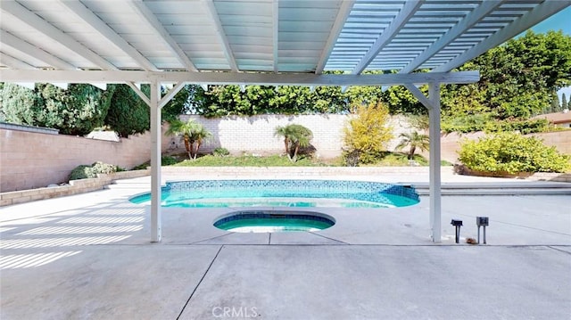 view of pool with a pergola, a patio, and an in ground hot tub