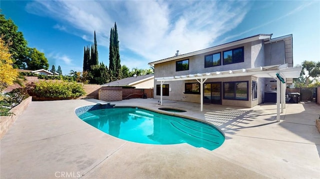 view of pool with a pergola, a patio, and an in ground hot tub