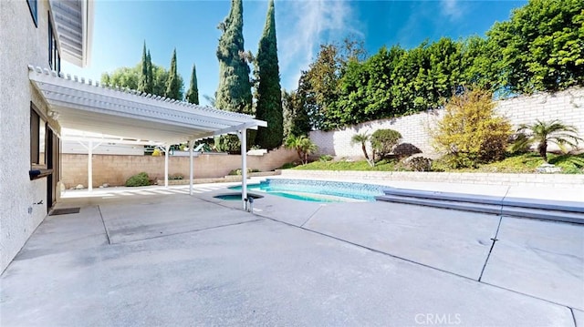 view of swimming pool featuring a pergola and a patio