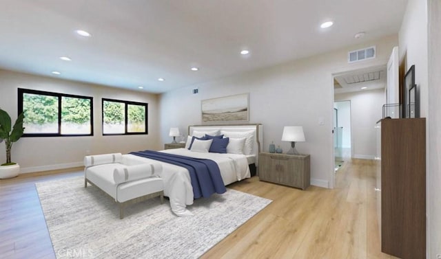 bedroom with light hardwood / wood-style floors