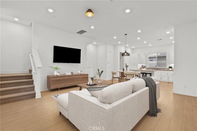 living room featuring light hardwood / wood-style flooring