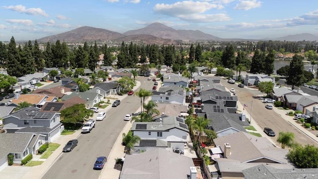 birds eye view of property featuring a mountain view