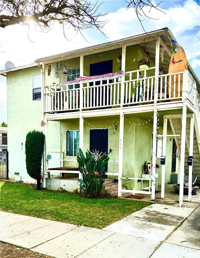 exterior space featuring a balcony