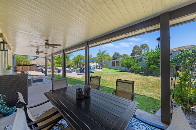 view of patio featuring ceiling fan and an outdoor living space