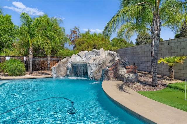 view of swimming pool featuring pool water feature