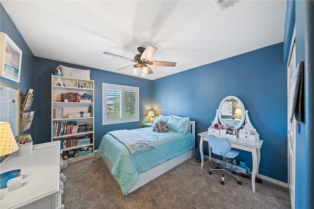 carpeted bedroom featuring ceiling fan