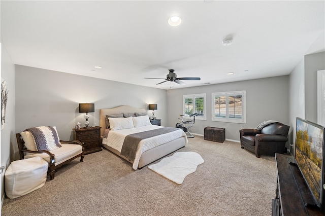 bedroom featuring light carpet and ceiling fan