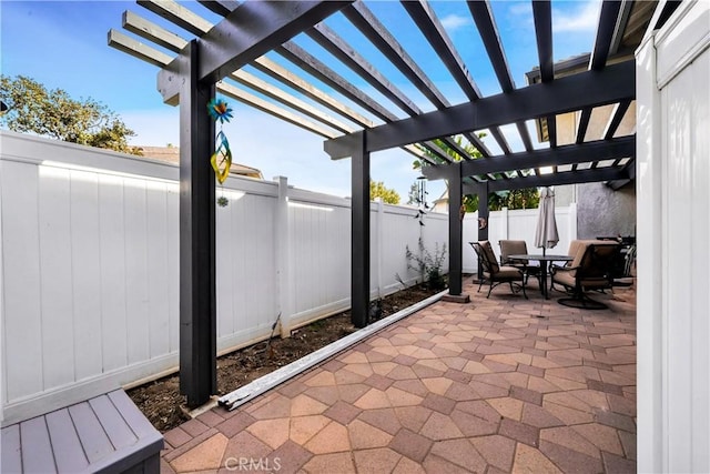 view of patio featuring a pergola