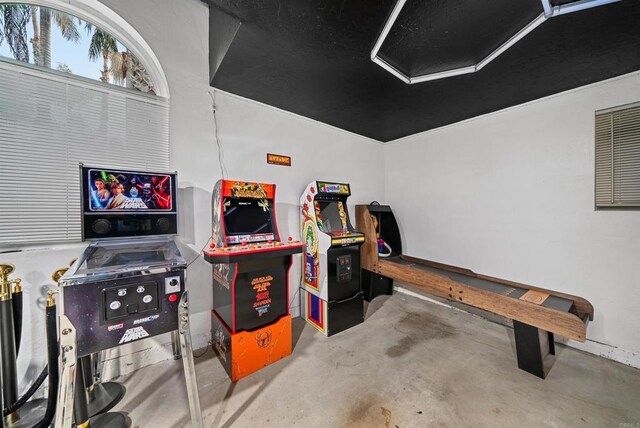 playroom featuring concrete flooring