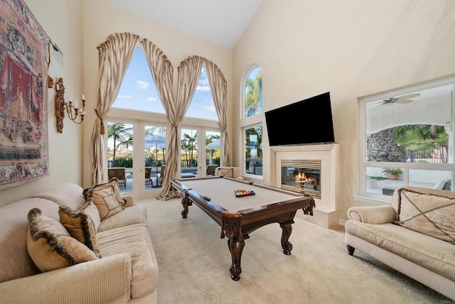 recreation room with light carpet, ceiling fan, pool table, french doors, and high vaulted ceiling