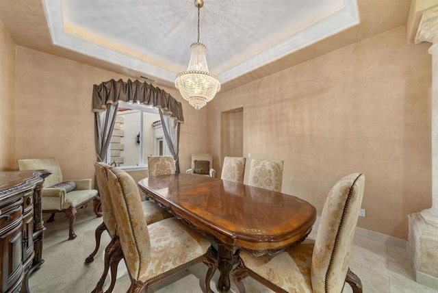 dining space with light tile patterned flooring, a raised ceiling, and an inviting chandelier