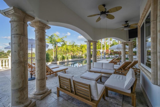 view of patio with an outdoor hangout area and ceiling fan