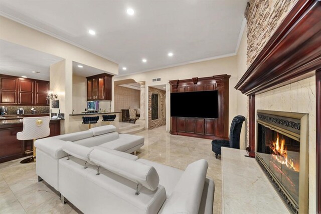 living room featuring ornamental molding