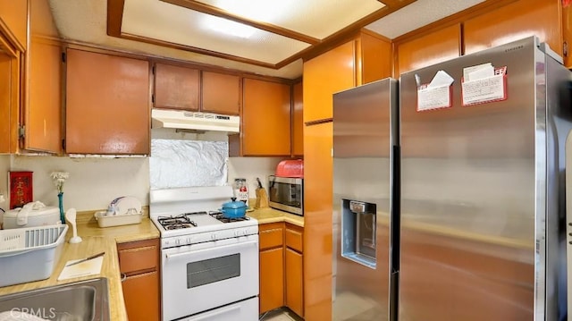 kitchen featuring appliances with stainless steel finishes and sink