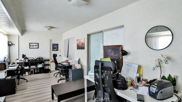 home office with light wood-type flooring