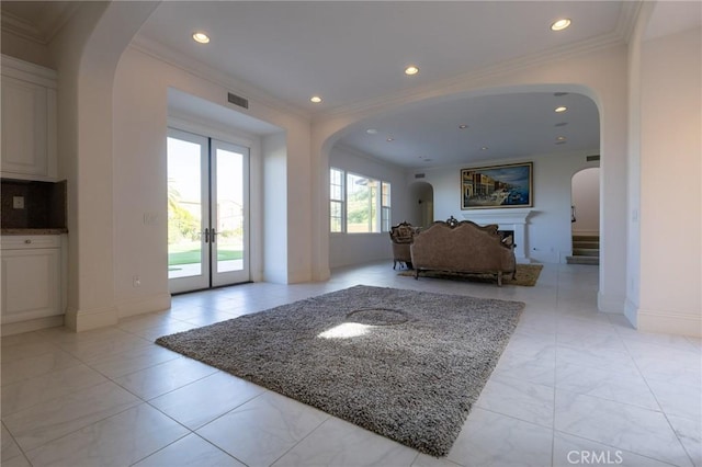 interior space featuring ornamental molding and french doors