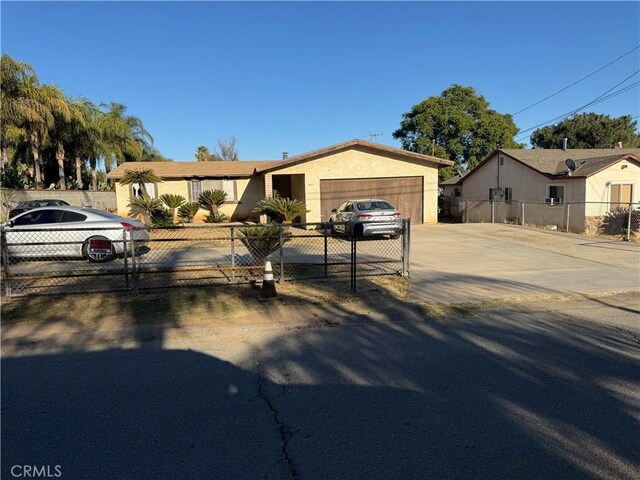 ranch-style home with a garage