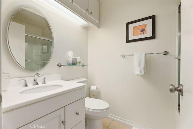 bathroom with a shower with shower door, toilet, vanity, and tile patterned flooring