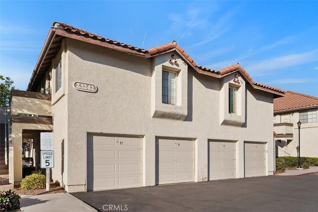 view of home's exterior with a garage