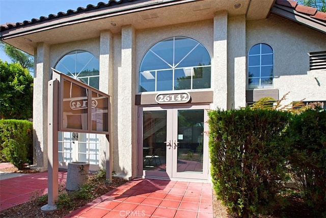 view of exterior entry with french doors