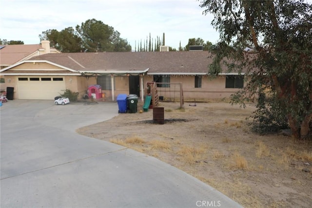 ranch-style home with a garage