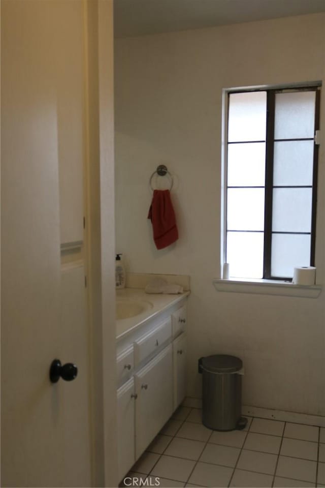 bathroom featuring vanity and tile patterned flooring