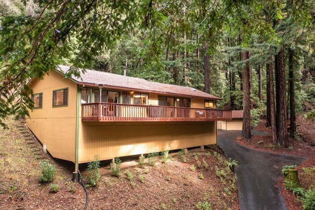 rear view of property with a deck