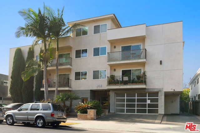 view of property featuring a garage