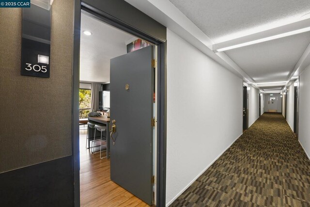 hall featuring wood-type flooring