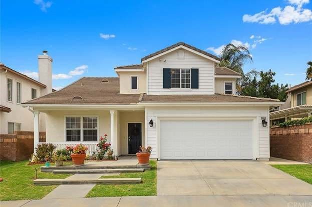 front of property with a garage