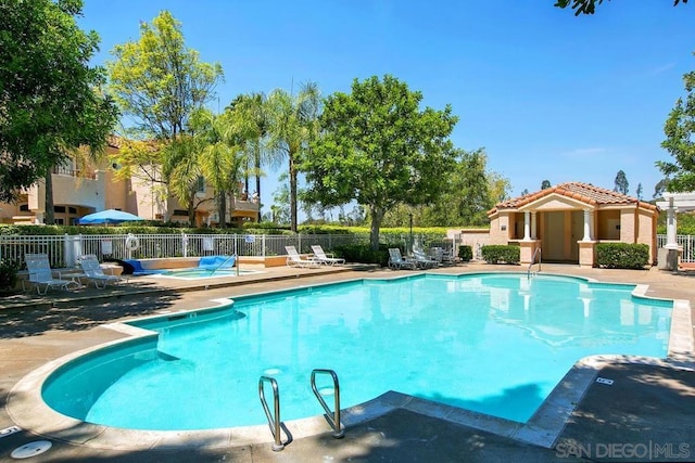 view of pool featuring a patio area