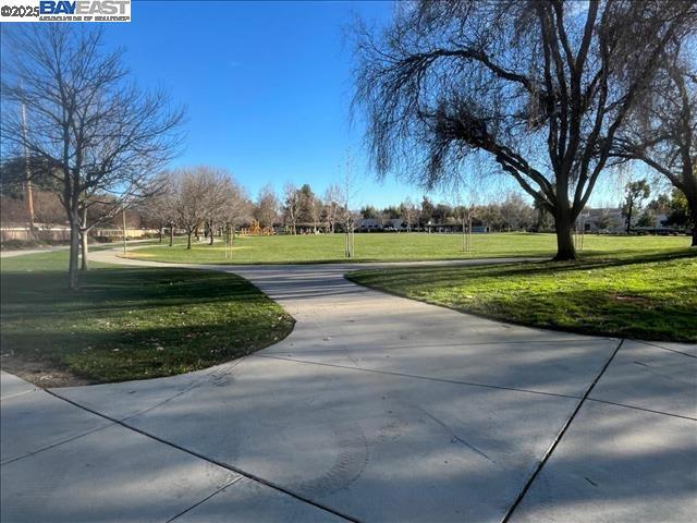 surrounding community featuring a lawn