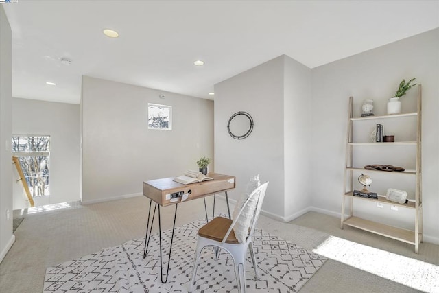 office space with light colored carpet