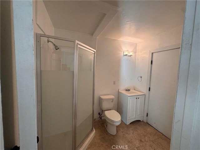 bathroom with toilet, a shower with shower door, and vanity