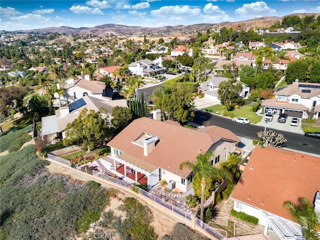 drone / aerial view featuring a mountain view