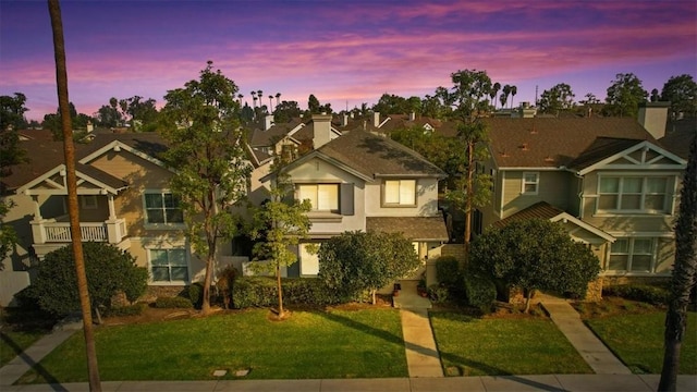 craftsman inspired home with a lawn