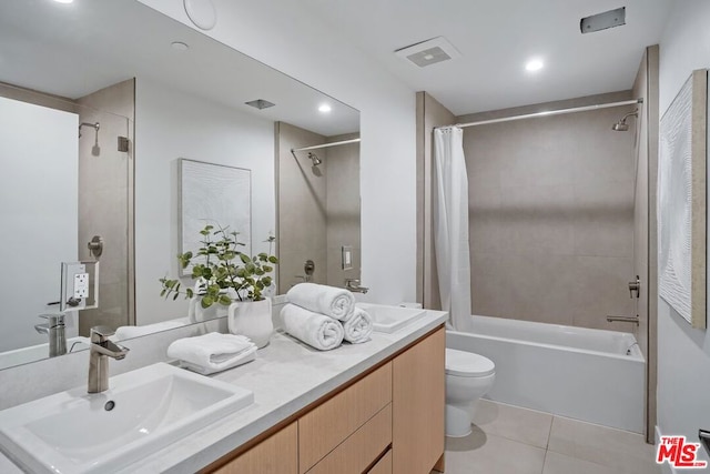 full bathroom with toilet, tile patterned flooring, shower / bathtub combination with curtain, and vanity