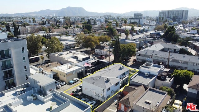 drone / aerial view featuring a mountain view