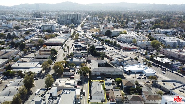 drone / aerial view featuring a mountain view