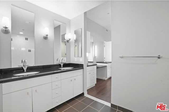 bathroom featuring tile patterned floors and vanity