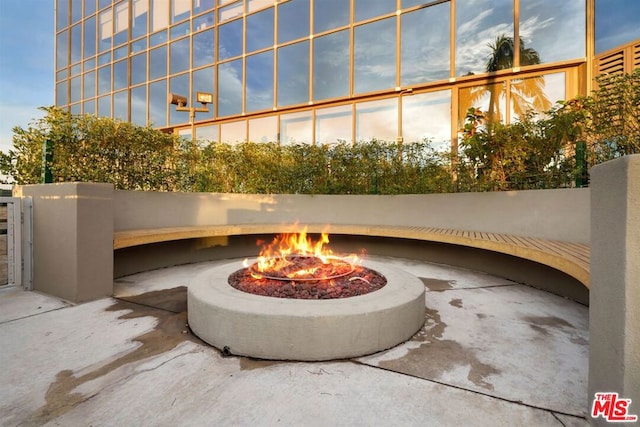 view of patio / terrace with a fire pit