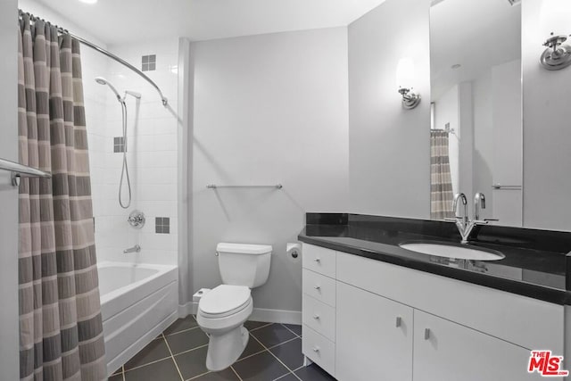 full bathroom with tile patterned floors, vanity, shower / bath combo, and toilet