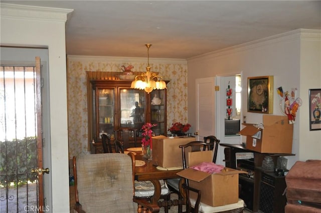 dining room with a wealth of natural light, crown molding, and a chandelier