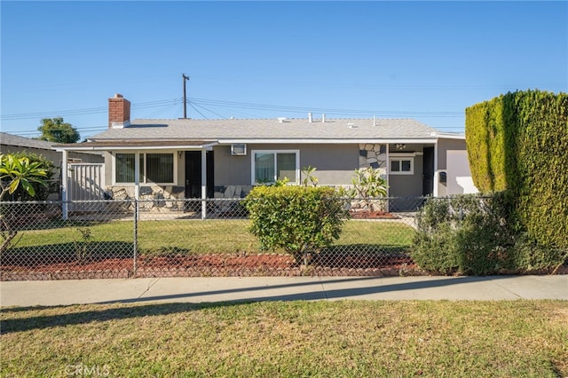 ranch-style house with a front yard