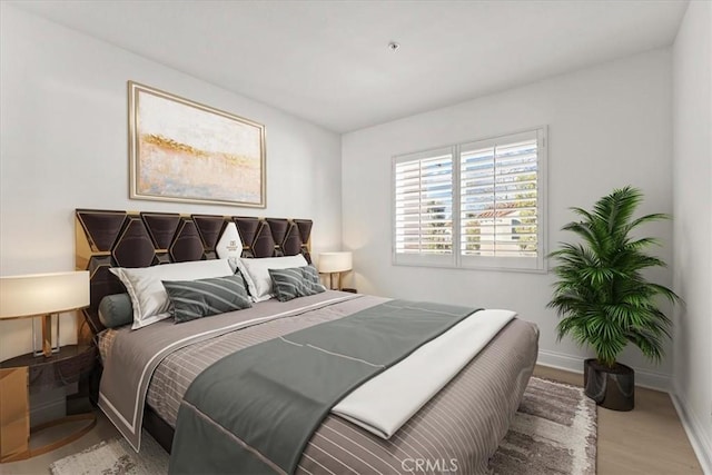 bedroom featuring light wood-type flooring