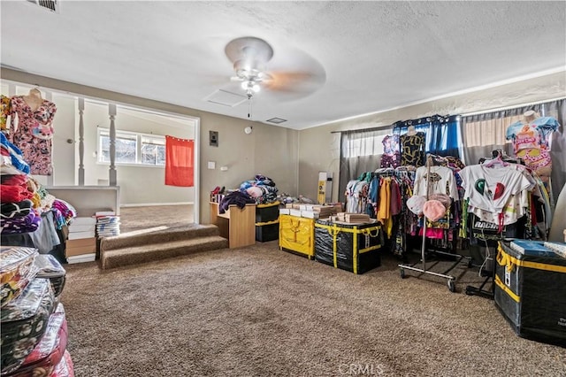 interior space featuring ceiling fan