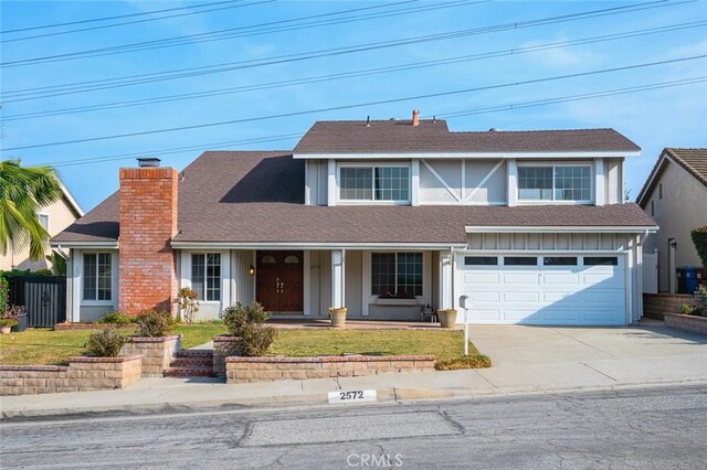 view of front of property with a garage